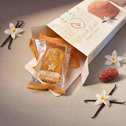 Packaged cookies with a branded box on a neutral background